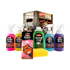 a car cleaning kit with a variety of cleaning bottles