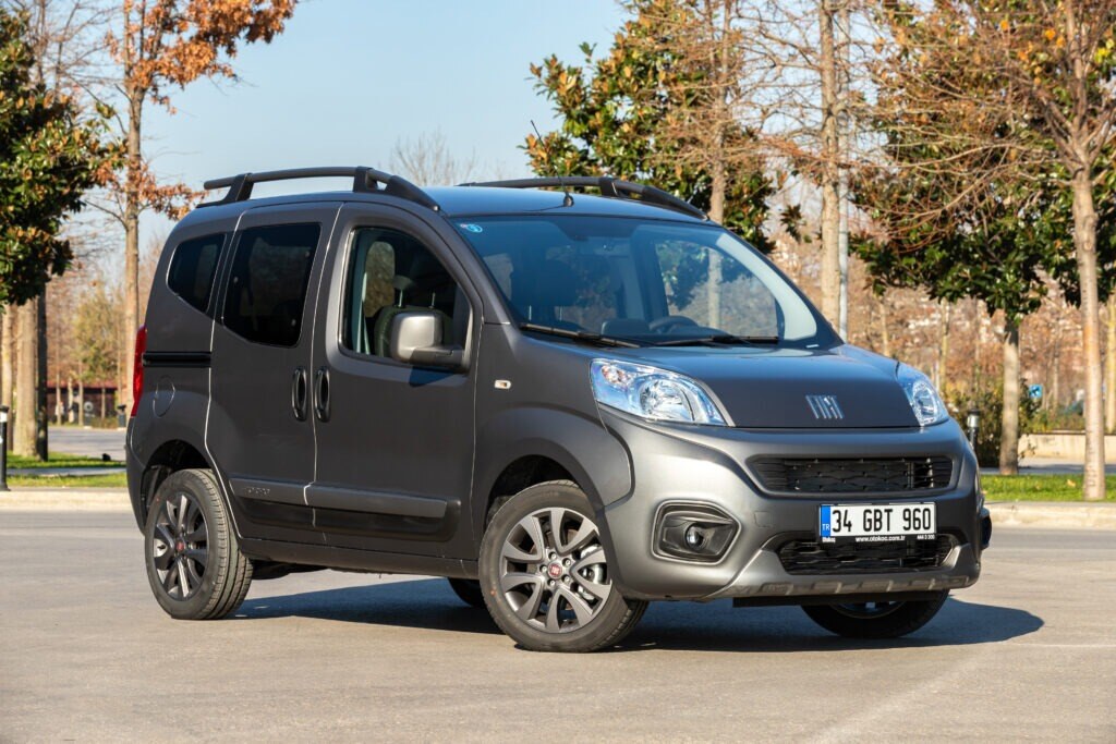 a grey fiat firorino outside