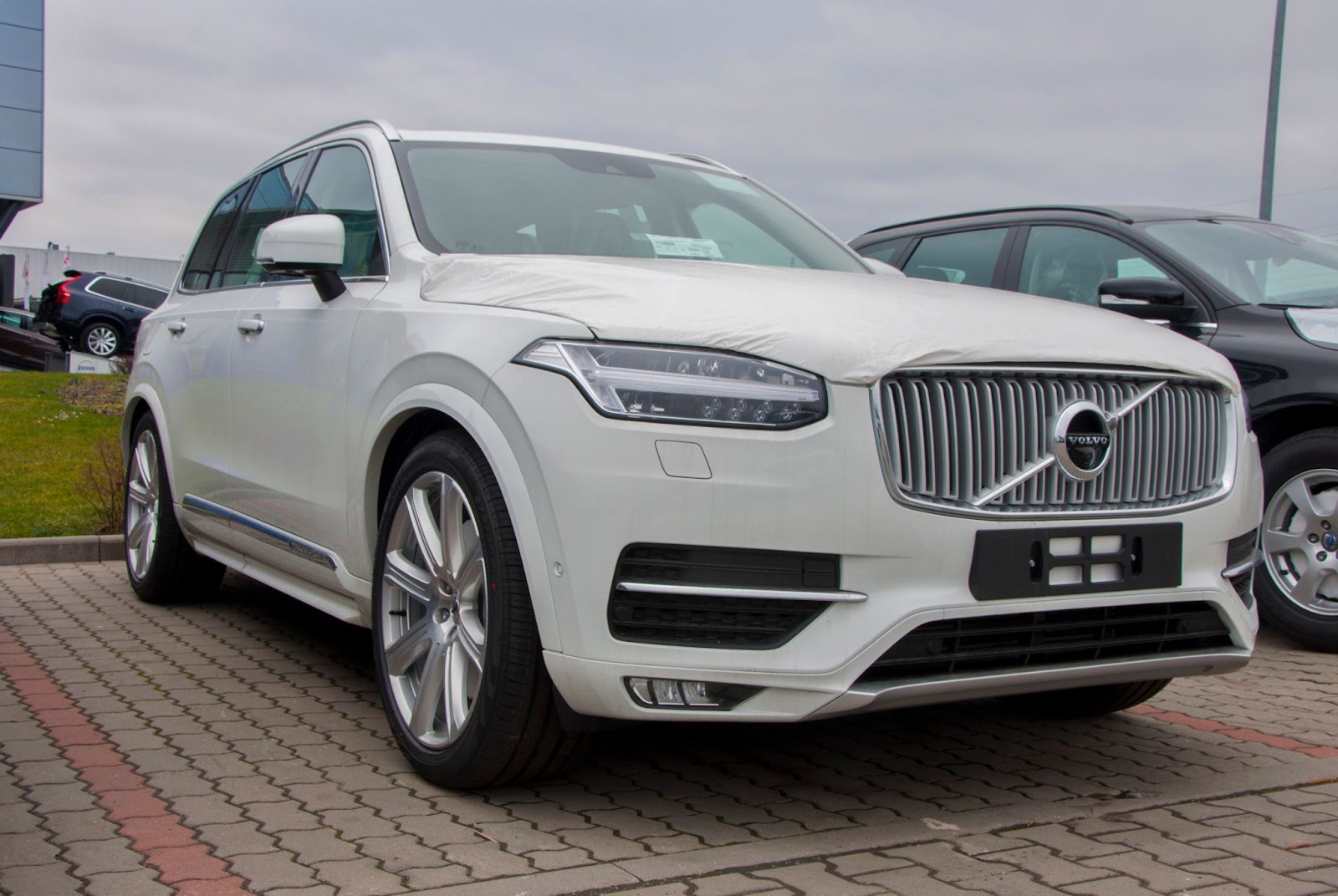 a white Volvo XC-90 Recharge Hybrid