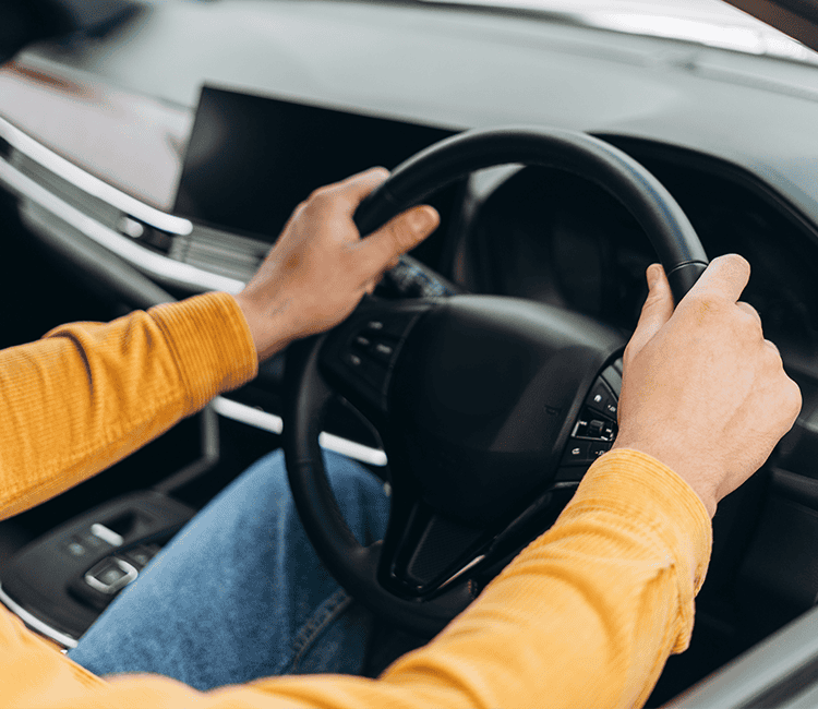 Man-driving-in-yellow-jacket-mobile_1