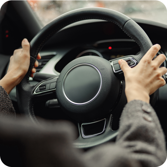 Close up of a turning steering wheel