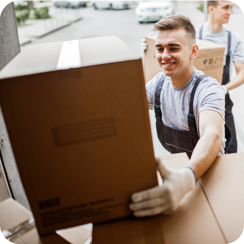 Men loading parcels into a van