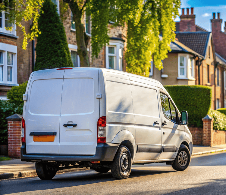white-van-parked-on-street 