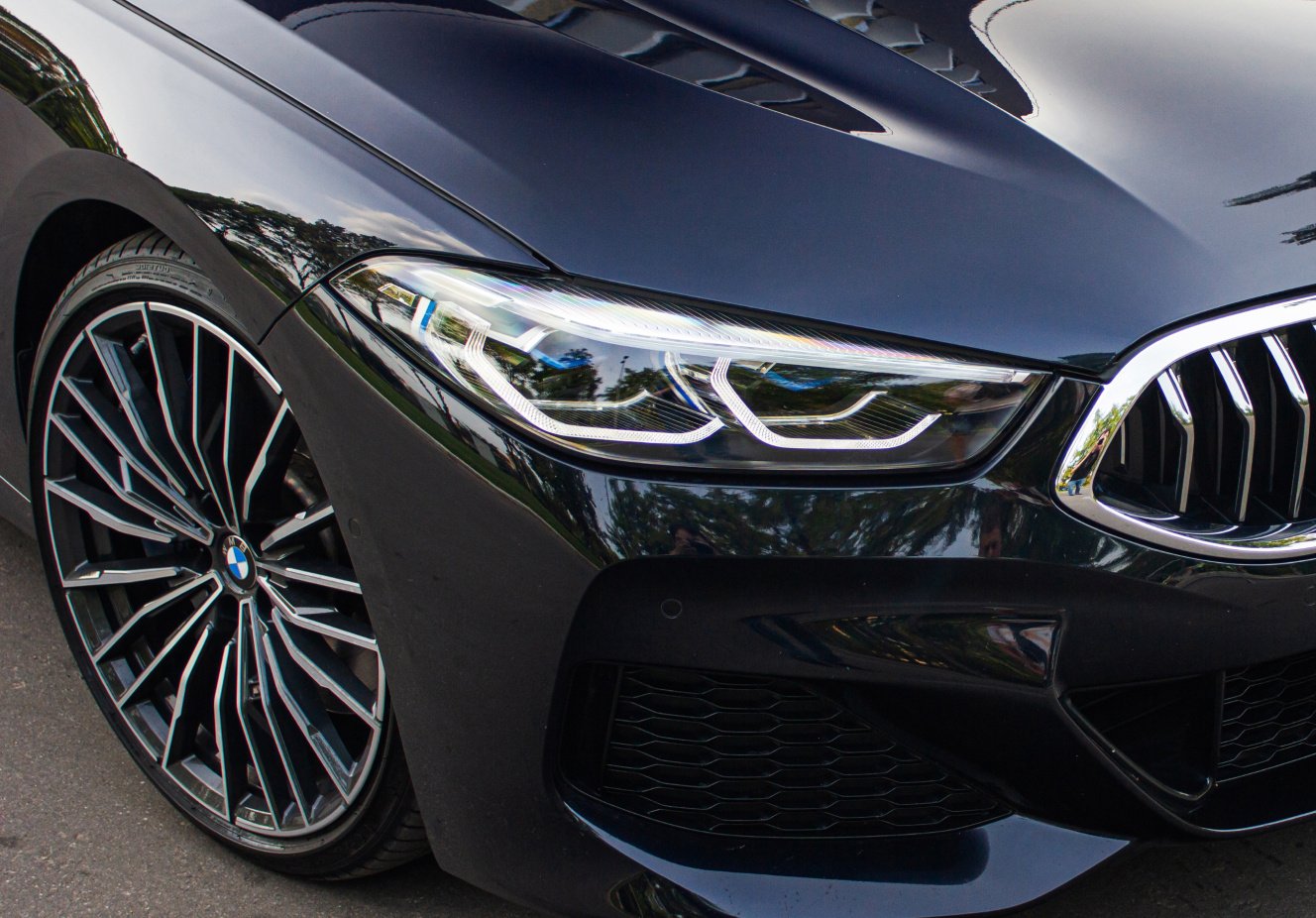 a close up of a black car bonnet