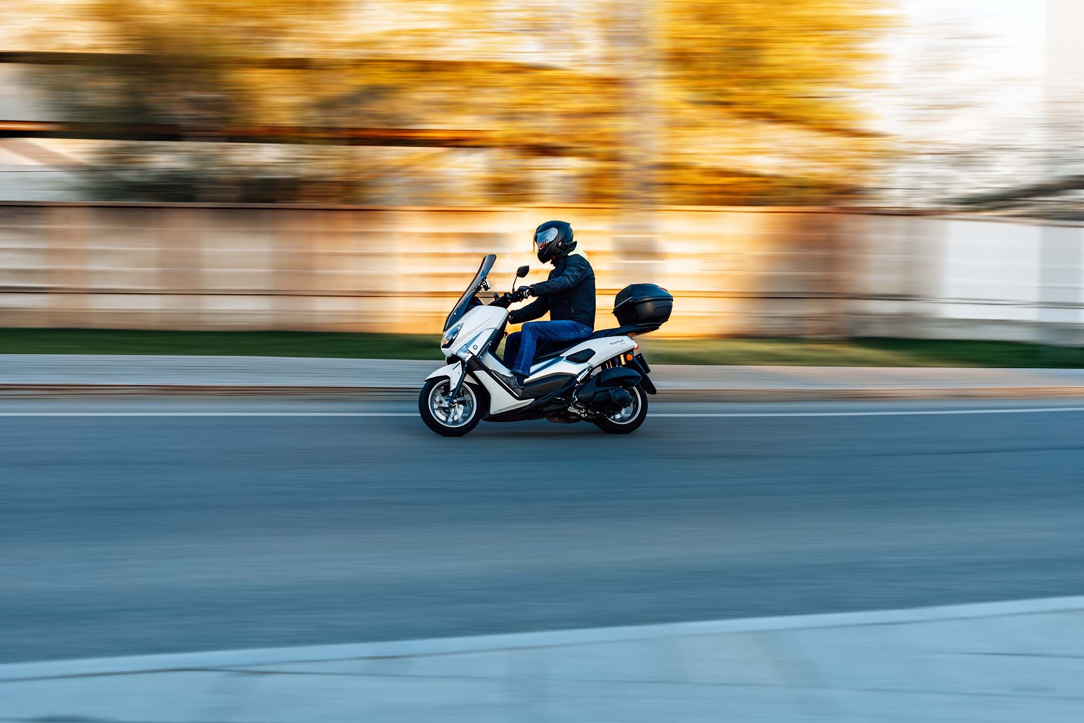 Yamaha NMAX125 in white - a popular choice of moped for fast food delivery drivers