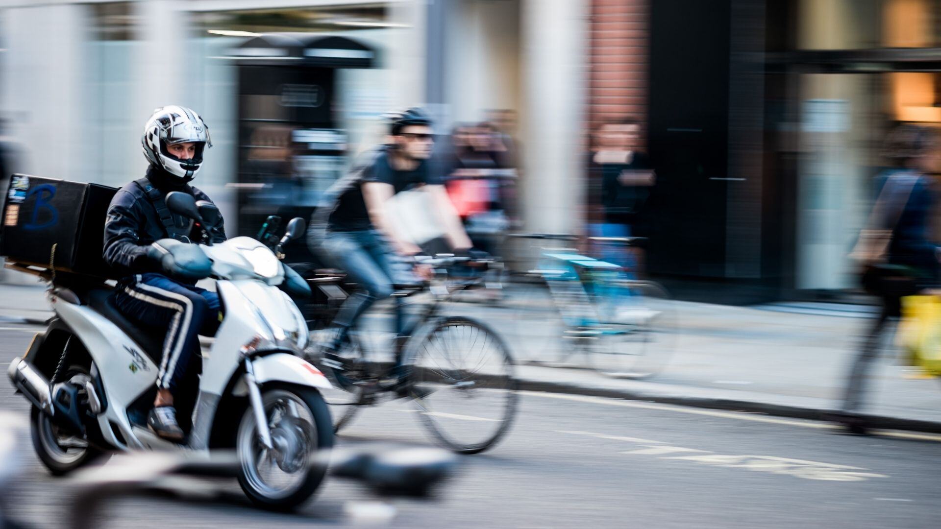 Choosing the right insurance: Motorbike delivery driving image