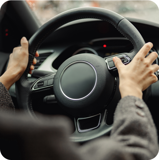 Close up of turning steering wheel