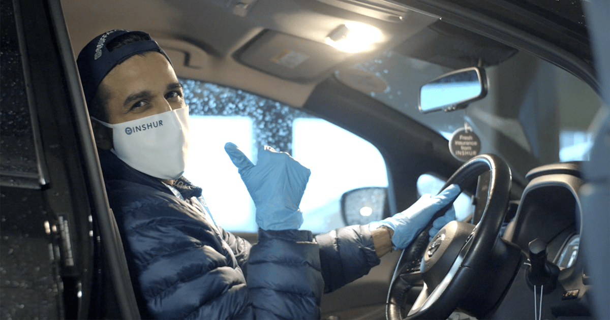 Uber driver with a mask and gloves