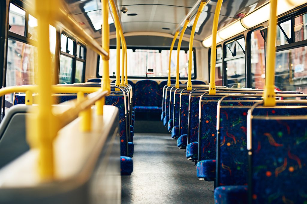 Cropped shot of empty seats on a public bus.